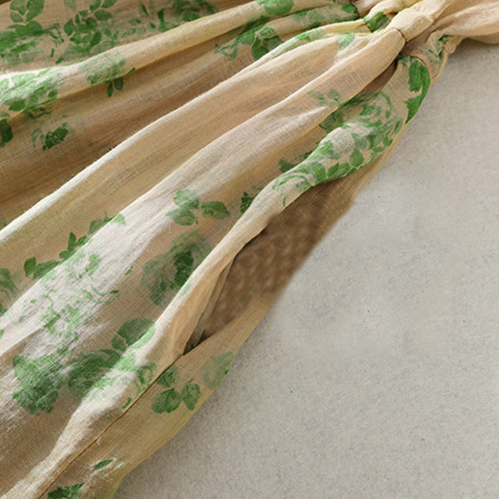 Abito midi in cotone con maniche corte, vita alta, coulisse, bottoni e tasche con stampa Buddha Stones - image 16