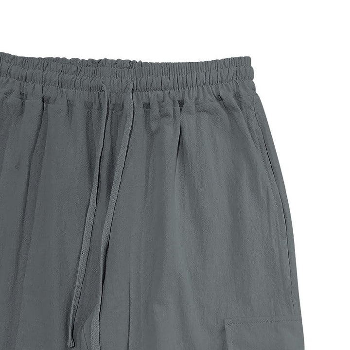 Pantaloni cargo da uomo in lino tinta unita con coulisse e tasche Buddha Stones - image 18