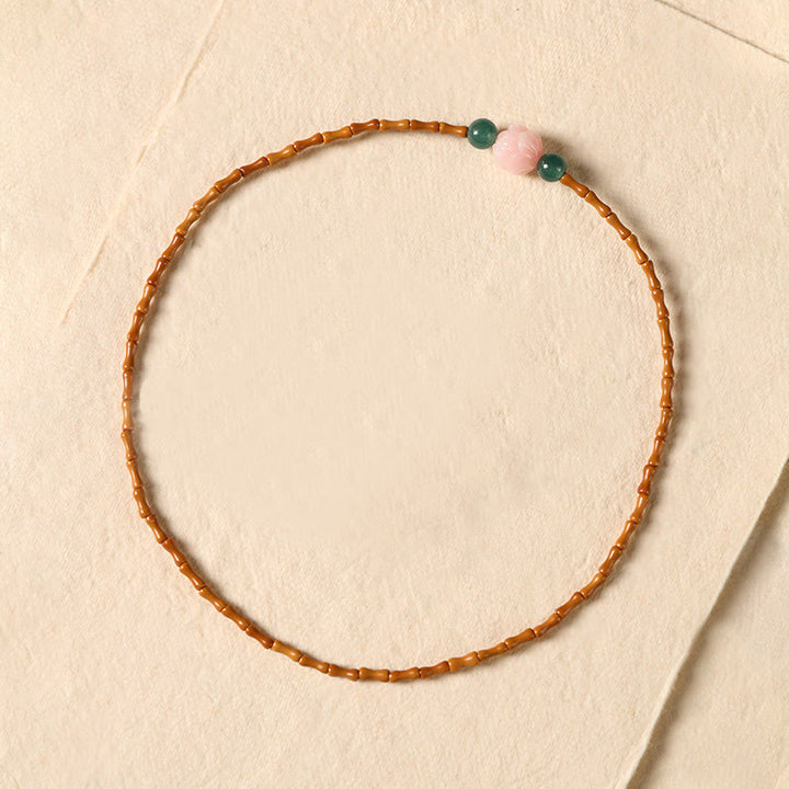 Buddha Stones Bracciale doppio cerchio ultra sottile con noccioli di oliva e loto per la forza interiore - image 3