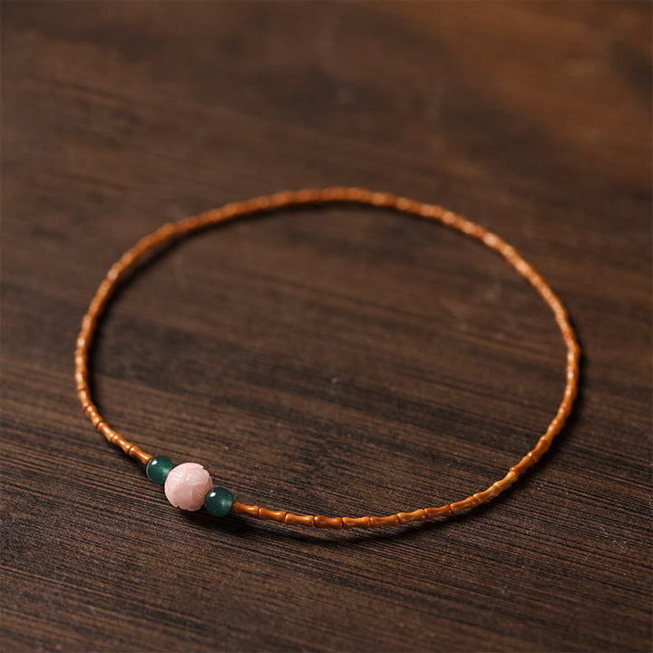 Buddha Stones Bracciale doppio cerchio ultra sottile con noccioli di oliva e loto per la forza interiore - image 2