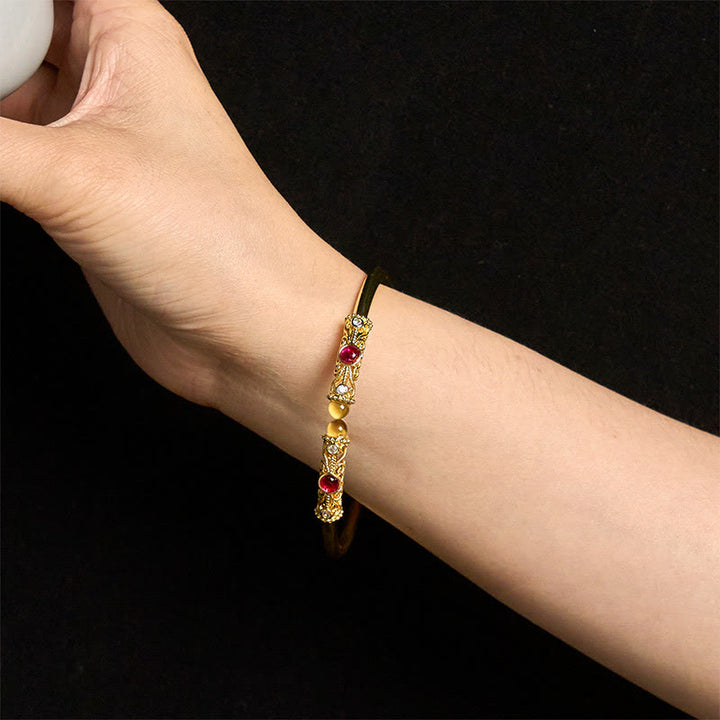Bracciale rigido con motivo floreale Buddha Stones, zircone rosso, ambra e rame portafortuna - image 13