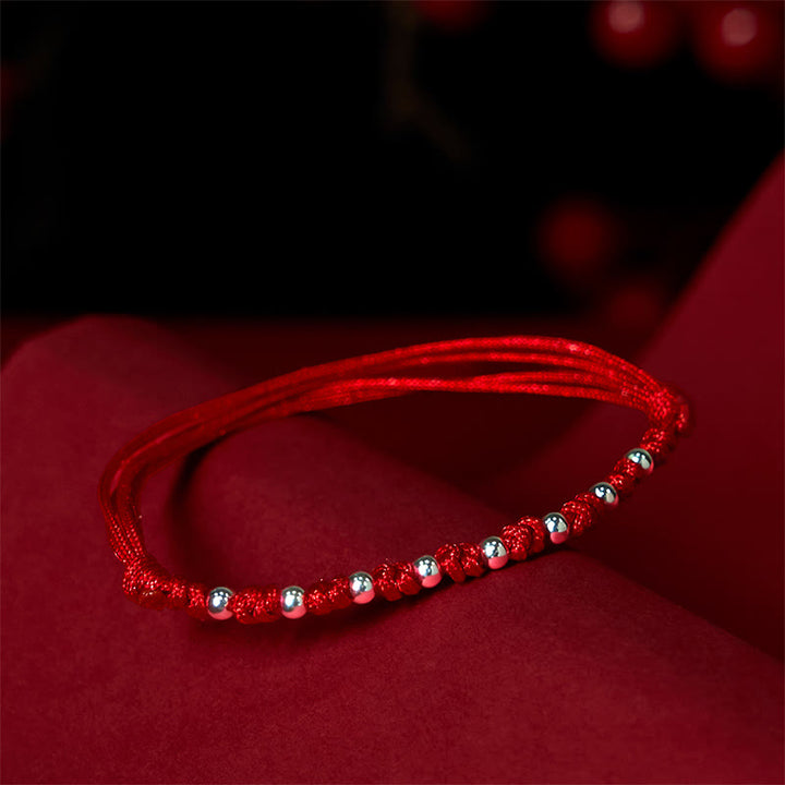Braccialetto portafortuna regolabile con perline in argento sterling 925 e cordino rosso Buddha Stones - image 2