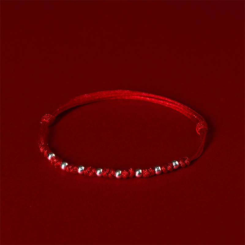 Braccialetto portafortuna regolabile con perline in argento sterling 925 e cordino rosso Buddha Stones - image 3