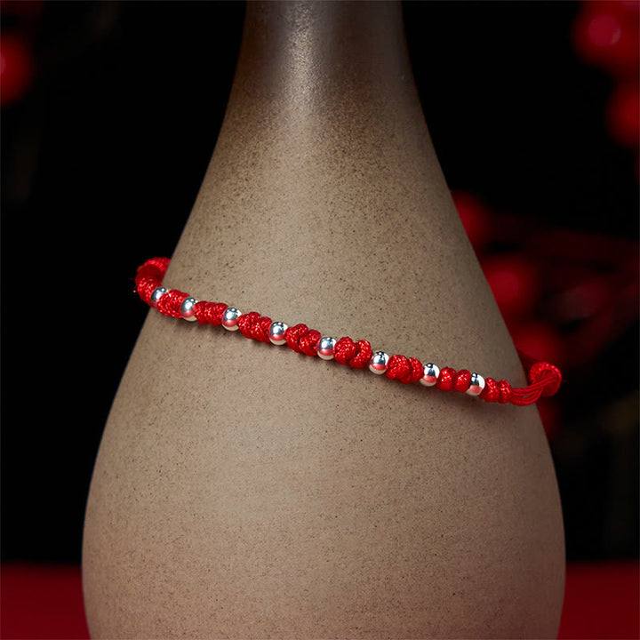 Braccialetto portafortuna regolabile con perline in argento sterling 925 e cordino rosso Buddha Stones - image 4