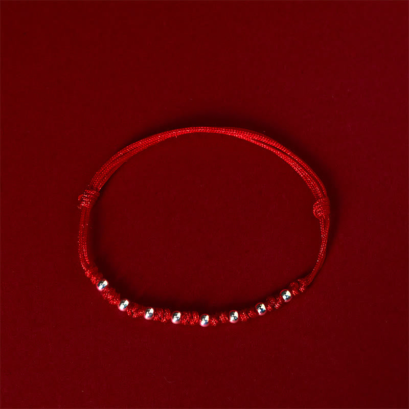 Braccialetto portafortuna regolabile con perline in argento sterling 925 e cordino rosso Buddha Stones - image 2