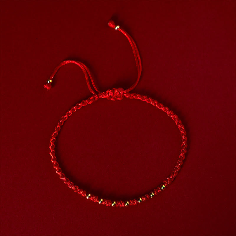 Braccialetto di protezione intrecciato con perline in argento sterling 925 placcato oro e cordino rosso Buddha Stones - image 1