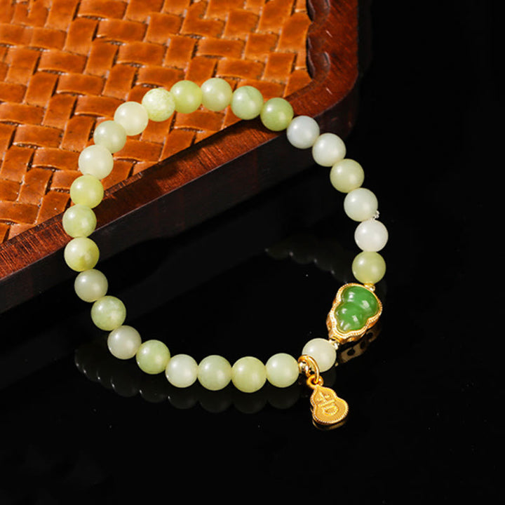 Braccialetto portafortuna con carattere Fu, giada naturale, avventurina verde e zucca Buddha Stones - Giada (circonferenza del polso: 14-16 cm) - image 1