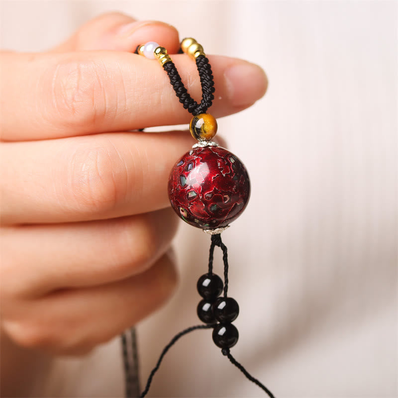 Collana con ciondolo in pietra Buddha Stones, legno di ebano, perlina di Venere, Aurora, lacca artigianale, pace - Fascino rosso (rosso casuale) - image 1