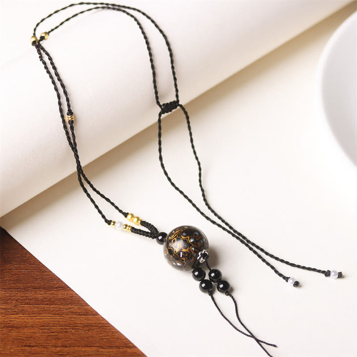 Collana con Buddha Stones, ebano, lacca Aurora, perline artigianali, perle, equilibrio - Ciondolo in oro nero (oro nero casuale) - image 17