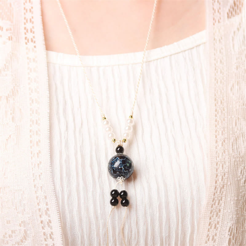 Collana con Buddha Stones, ebano, lacca Aurora, perline artigianali, perle, equilibrio - image 6