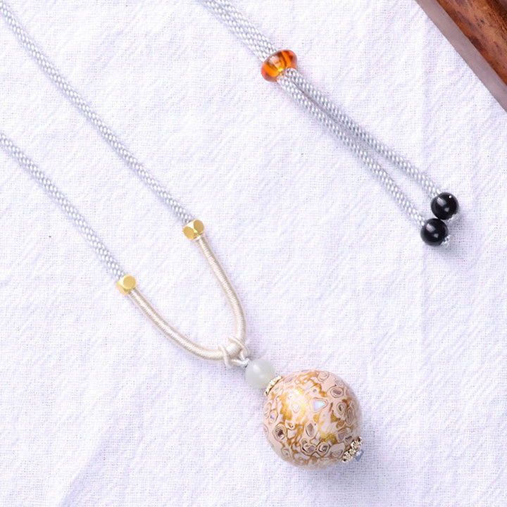 Collana con Buddha Stones, legno di ebano, lacca colorata, perline artigianali, calma - image 11