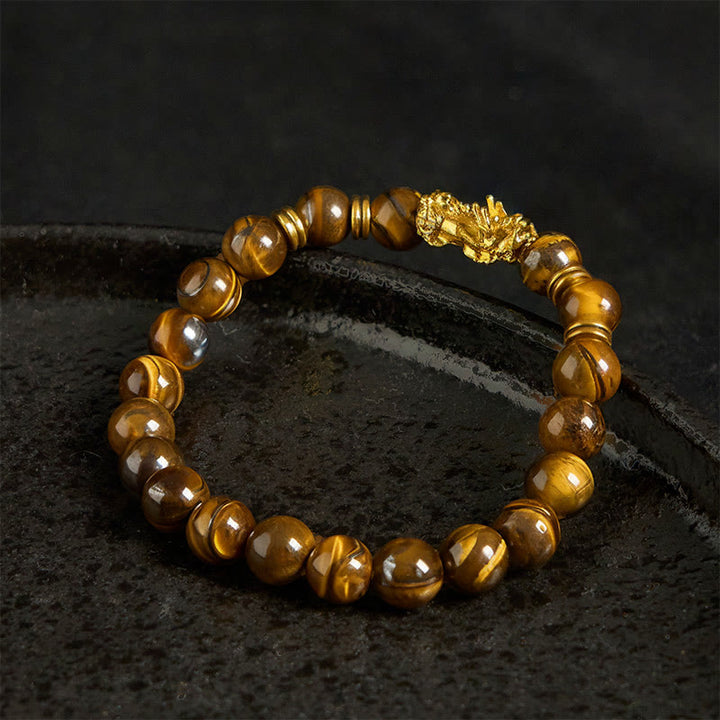 Braccialetto Pixiu Wealth Courage con perline distanziatrici in occhio di tigre di vari colori Buddha Stones - image 17
