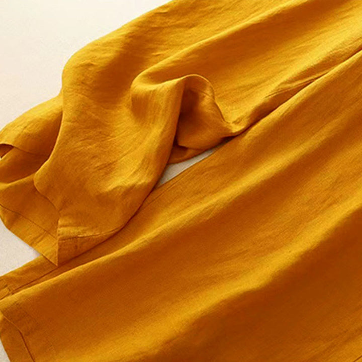 Pantaloni Capri larghi da donna con tasche, tinta unita e un bottone, modello Buddha Stones - image 5