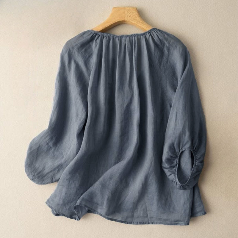 Camicia da donna vintage con bottoni e maniche a tre quarti a sbuffo e scollo a V, con stampa Buddha Stones. - image 1
