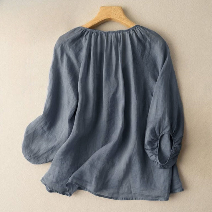 Camicia da donna vintage con bottoni e maniche a tre quarti a sbuffo e scollo a V, con stampa Buddha Stones. - image 1