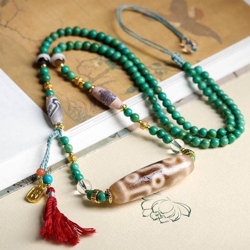 Collana con ciondolo di protezione in pietra Buddha Stones Dzi tibetana, perlina turchese - image 5