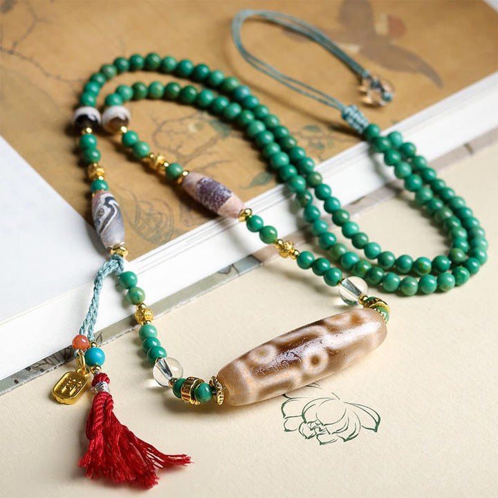 Collana con ciondolo di protezione in pietra Buddha Stones Dzi tibetana, perlina turchese - image 5