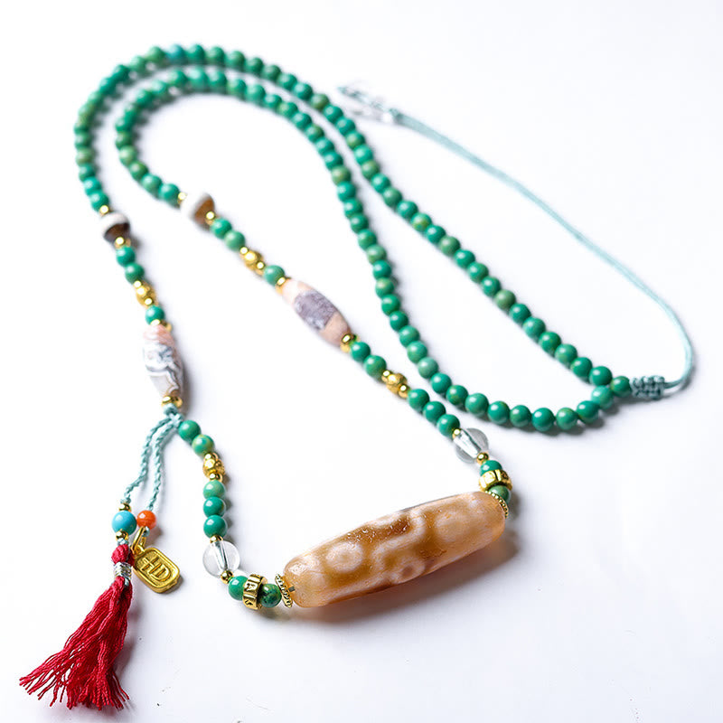 Collana con ciondolo di protezione in pietra Buddha Stones Dzi tibetana, perlina turchese - image 8