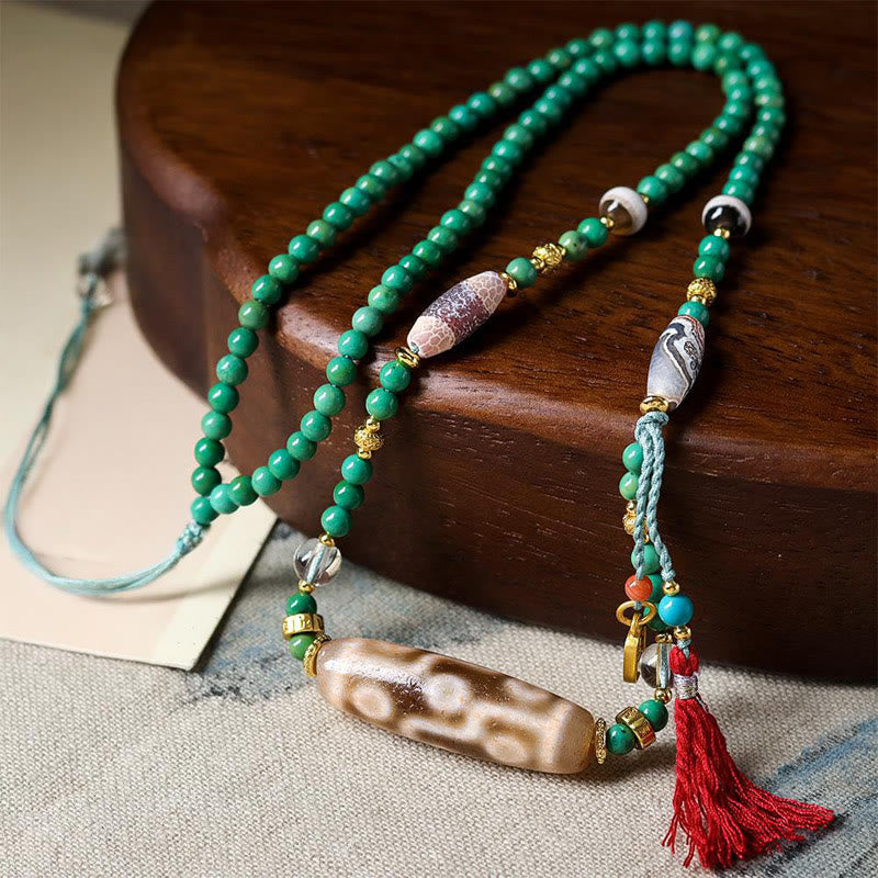 Collana con ciondolo di protezione in pietra Buddha Stones Dzi tibetana, perlina turchese - Perlina di turchese e Dzi - image 1