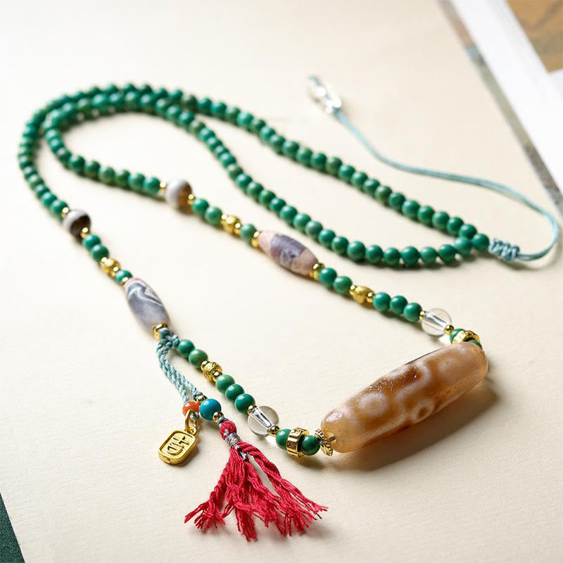 Collana con ciondolo di protezione in pietra Buddha Stones Dzi tibetana, perlina turchese - image 4