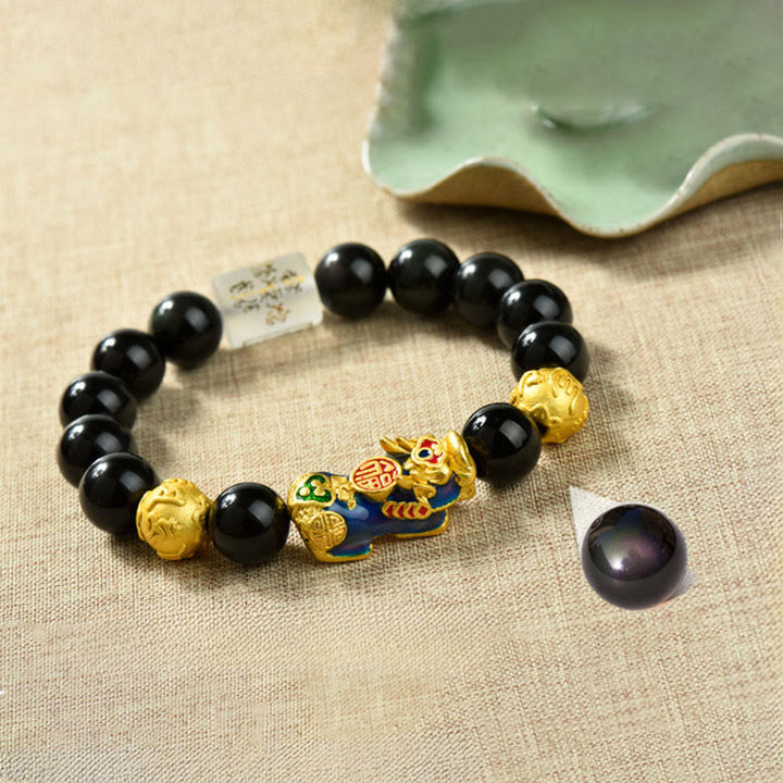 Braccialetto della ricchezza con perline di ossidiana arcobaleno in rame Pixiu Buddha Stones Fengshui - Personaggio Om Mani Padme Hum & Fu e Pixiu che cambia colore (circonferenza del polso: 18-19 cm) - image 1