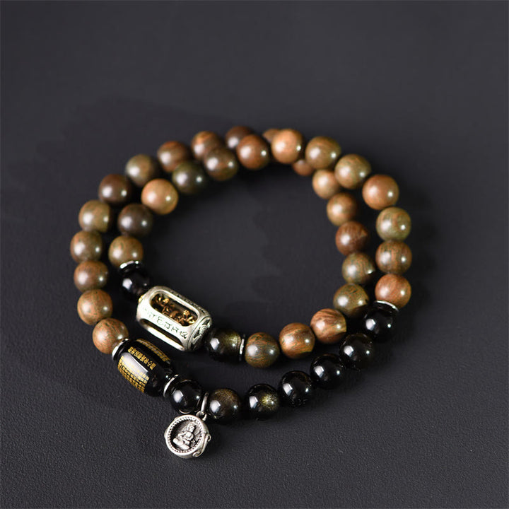 Bracciale a doppio giro in ossidiana, sandalo verde tibetano, lucentezza dorata e equilibrio della pace, Buddha Stones - 18-19 cm - image 1