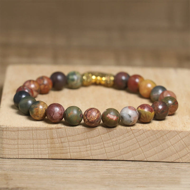 Braccialetto antistress con motivo a loto in pietra naturale colorata dell'imperatore Buddha Stones - image 5