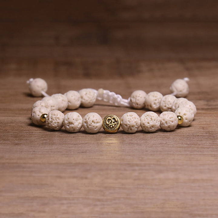 Braccialetto di guarigione calma con simbolo Om Buddha Stones in pietra lavica bianca - Roccia lavica bianca (circonferenza del polso: 15-21 cm) - image 1