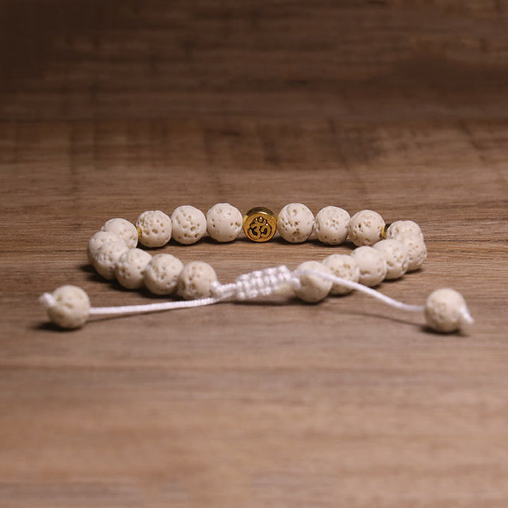 Braccialetto di guarigione calma con simbolo Om Buddha Stones in pietra lavica bianca - image 2