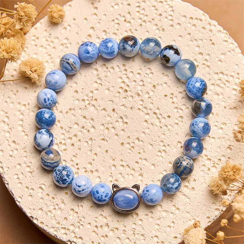 Braccialetto di protezione in agata blu e cianite con testa di gatto naturale Buddha Stones - image 1