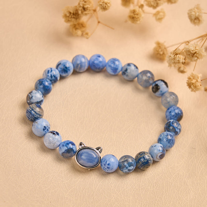 Braccialetto di protezione in agata blu e cianite con testa di gatto naturale Buddha Stones - image 2