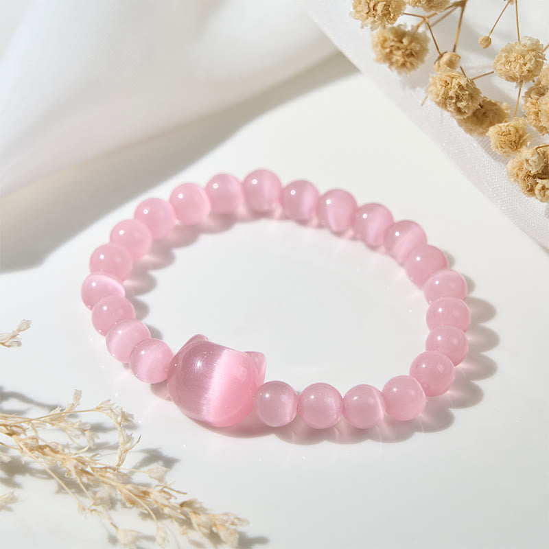 Braccialetto di perline spirituali con testa di Buddha Stones, occhio di gatto rosa e occhio di gatto bianco - image 1
