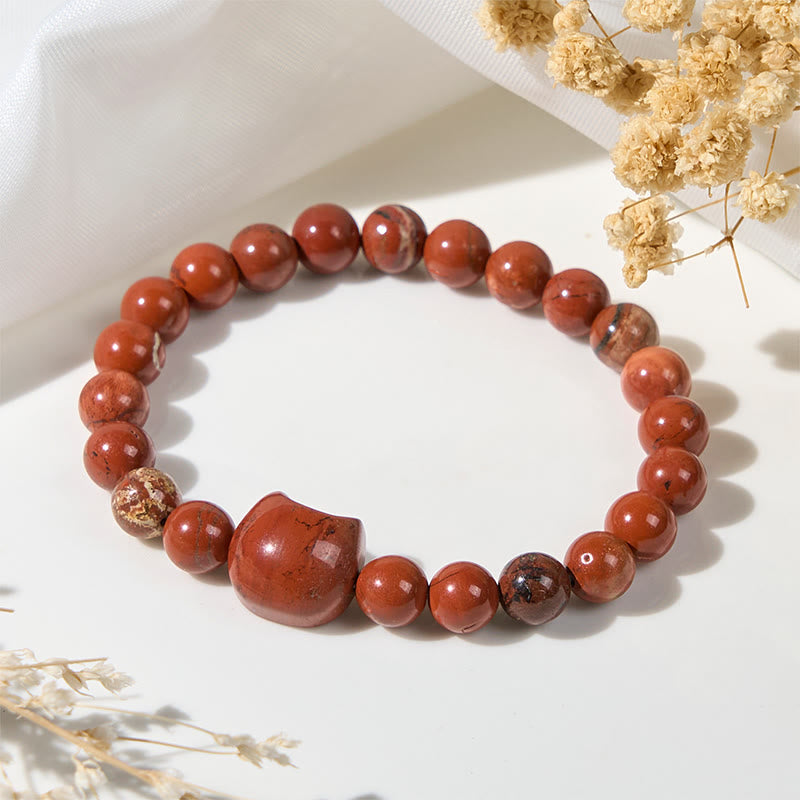 Braccialetto portafortuna turchese rosso con testa di gatto senza volto di Buddha Stones - image 3