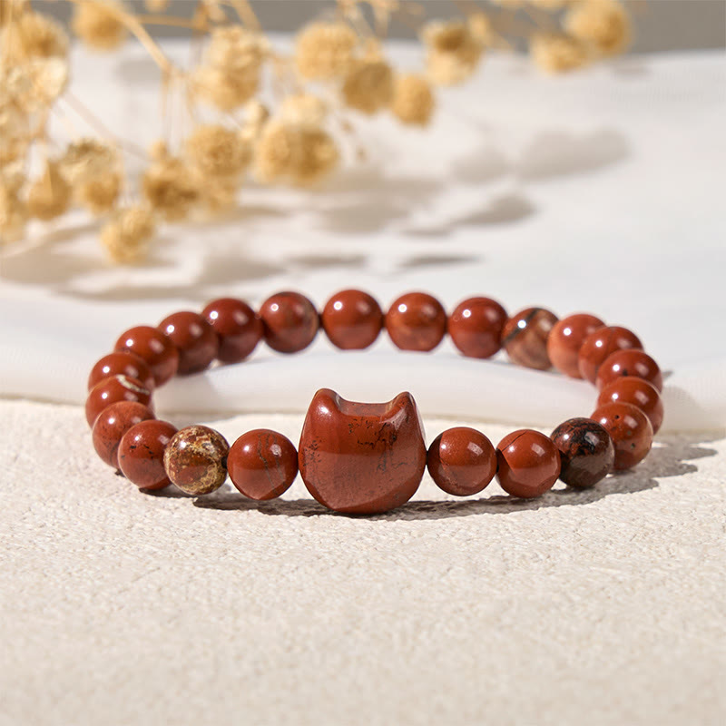 Braccialetto portafortuna turchese rosso con testa di gatto senza volto di Buddha Stones - image 2