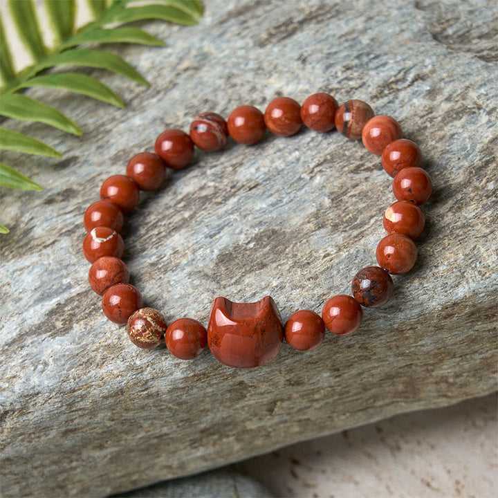 Braccialetto portafortuna turchese rosso con testa di gatto senza volto di Buddha Stones - image 7