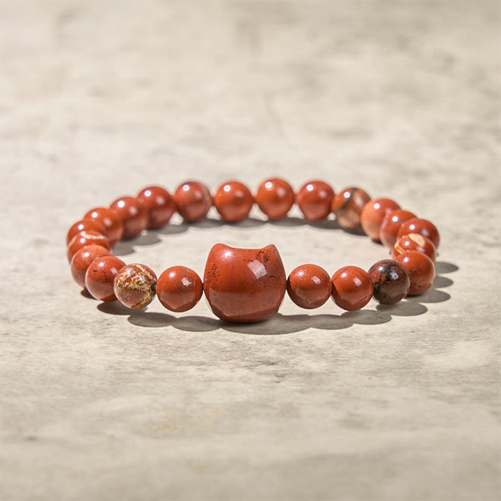 Braccialetto portafortuna turchese rosso con testa di gatto senza volto di Buddha Stones - image 4