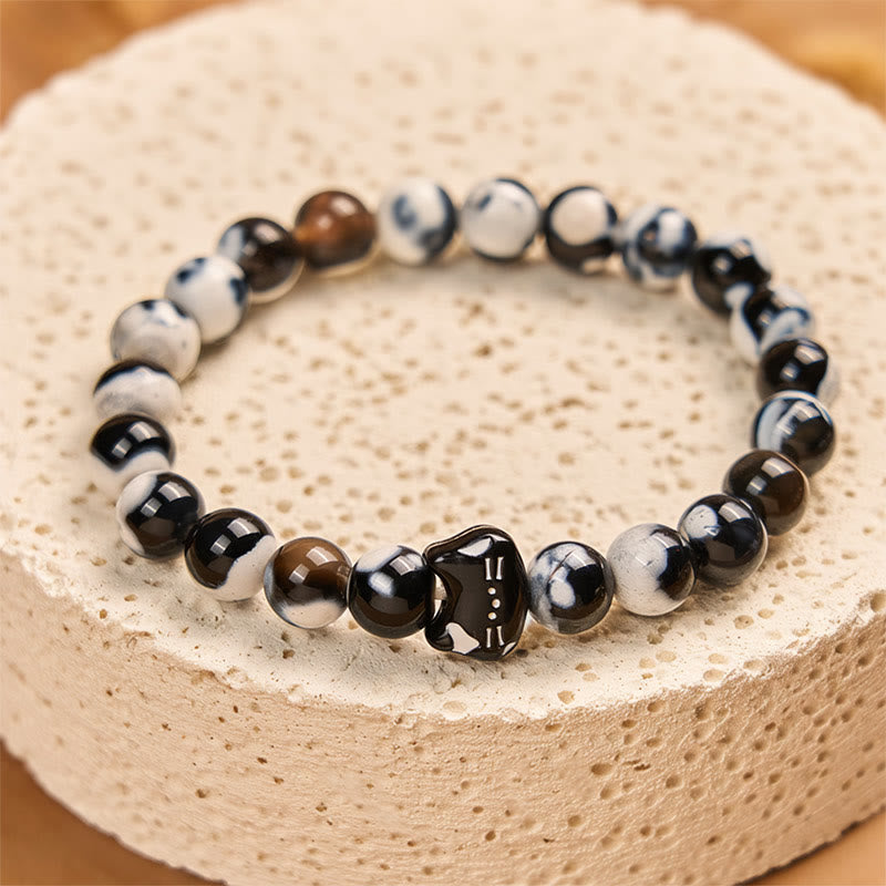 Bracciale Buddha Stones con agata di fuoco bianca e nera e gatto - image 2