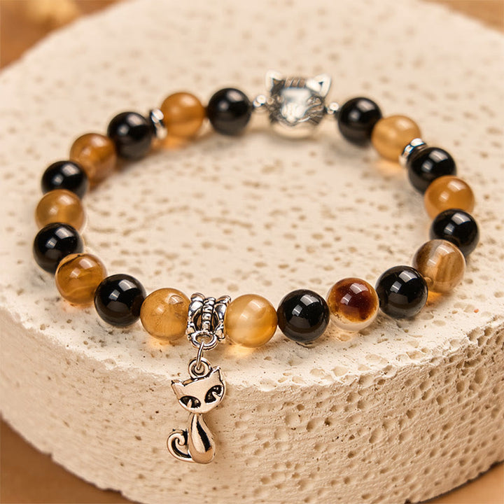 Braccialetto di protezione in onice nero con agata striata marrone chiaro e tartaruga Buddha Stones - image 2