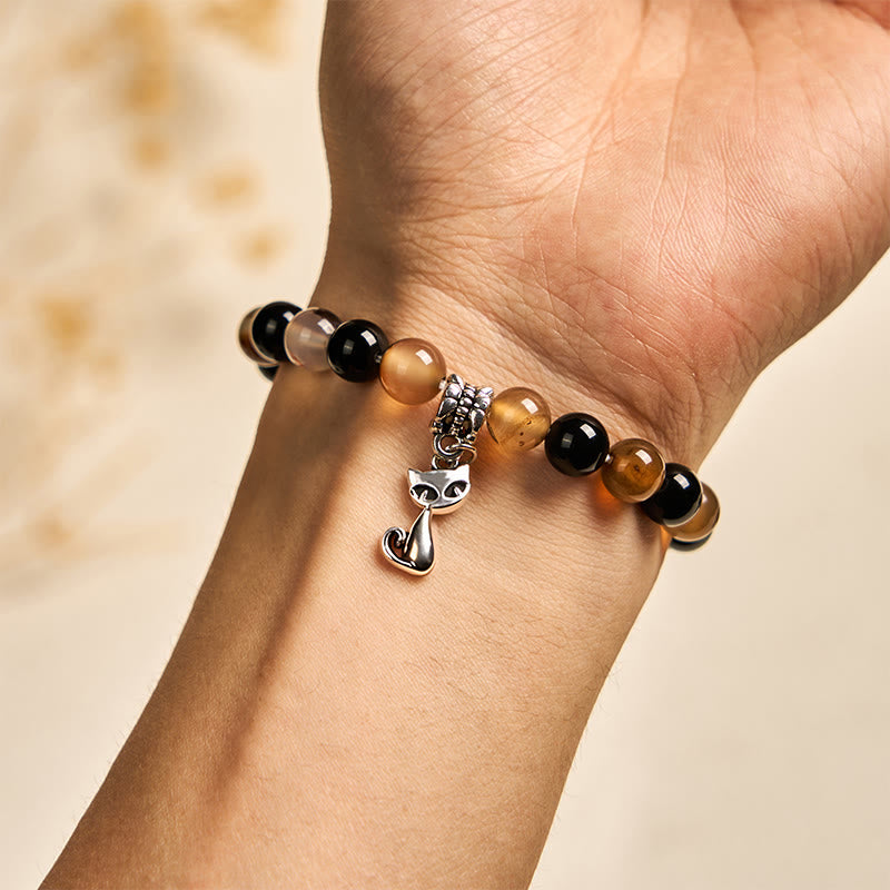 Braccialetto di protezione in onice nero con agata striata marrone chiaro e tartaruga Buddha Stones - image 4