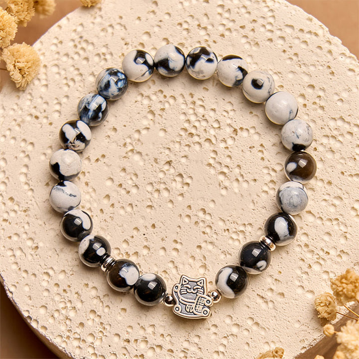 Bracciale Buddha Stones in argento sterling 925 con perline di agata di fuoco bianca e nera - image 2