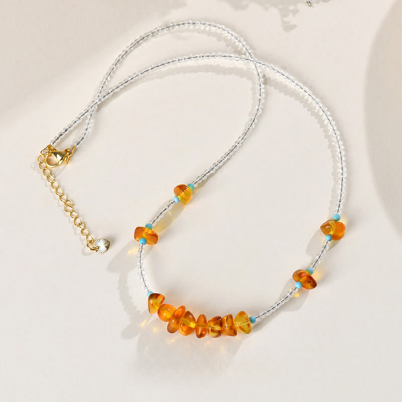 Collana con ciondolo in ambra di purezza irregolare con perline di cristallo bianco Buddha Stones - image 3