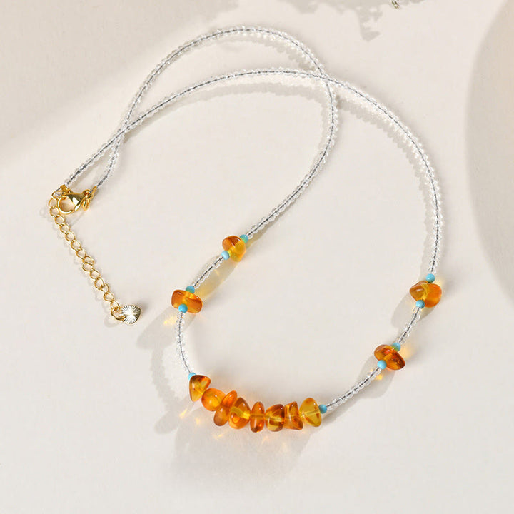 Collana con ciondolo in ambra di purezza irregolare con perline di cristallo bianco Buddha Stones - image 3