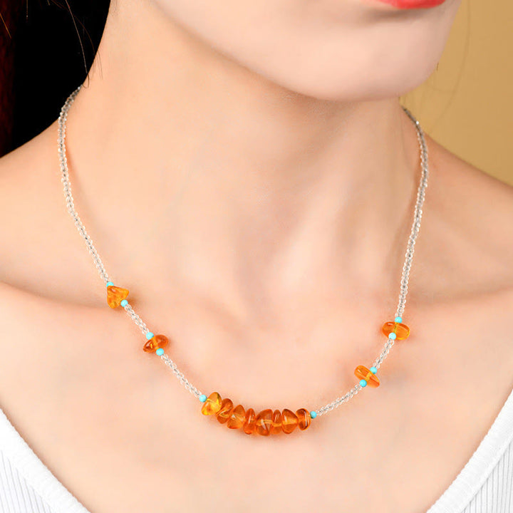 Collana con ciondolo in ambra di purezza irregolare con perline di cristallo bianco Buddha Stones - image 5