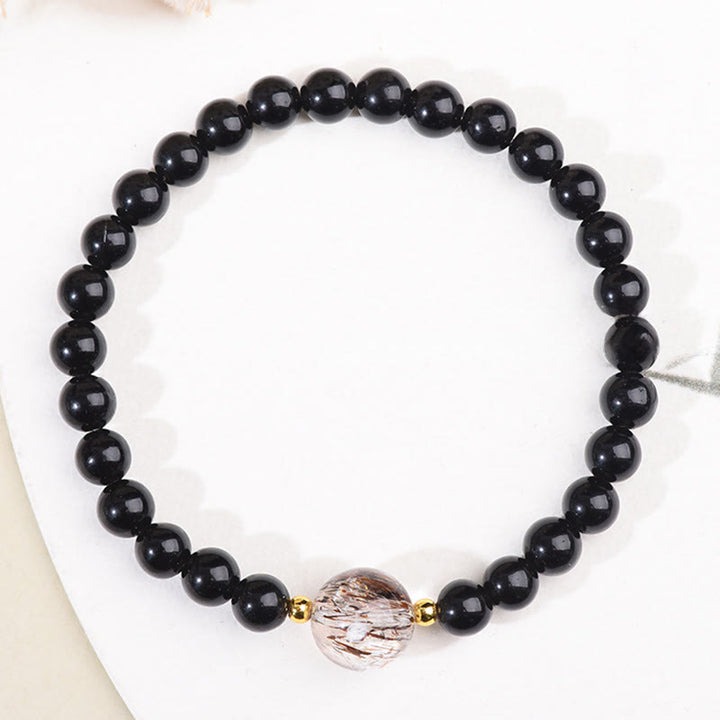 Braccialetto di perle di coraggio in ossidiana nera con occhio di tigre e Buddha Stones - image 8