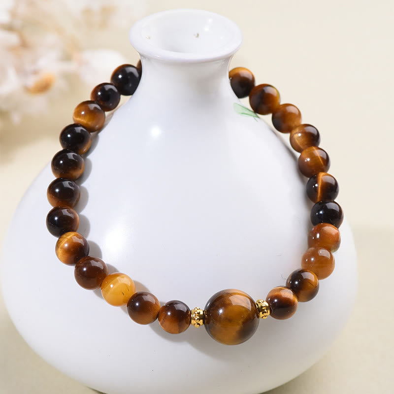 Braccialetto di perle di coraggio in ossidiana nera con occhio di tigre e Buddha Stones - image 3