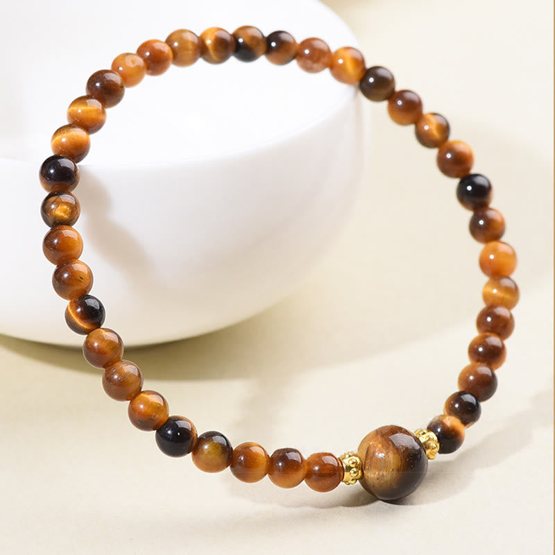 Braccialetto di perle di coraggio in ossidiana nera con occhio di tigre e Buddha Stones - image 4