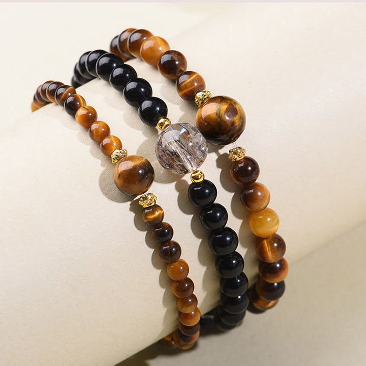 Braccialetto di perle di coraggio in ossidiana nera con occhio di tigre e Buddha Stones - image 10