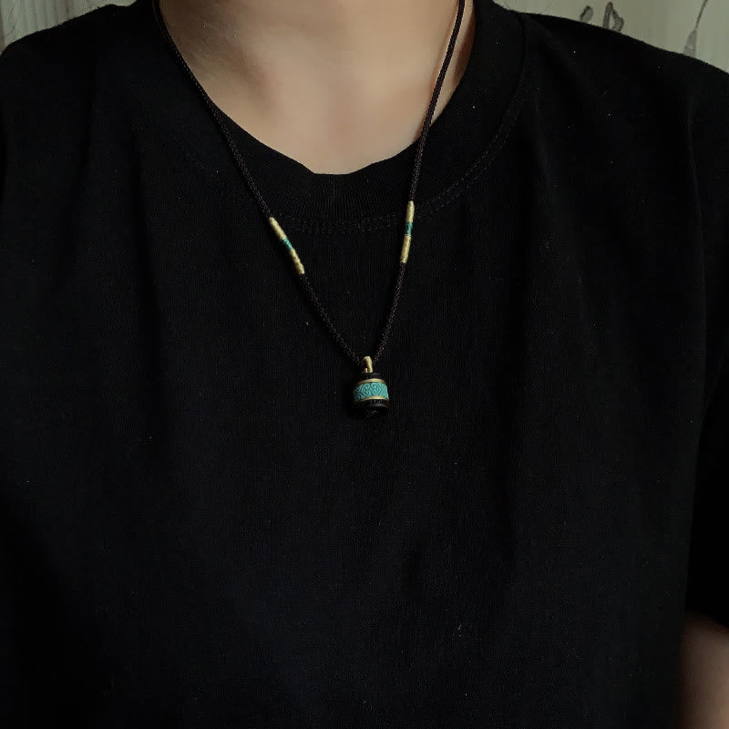 Collana con ciondolo della pace in legno di ebano e turchese Buddha Stones - image 7