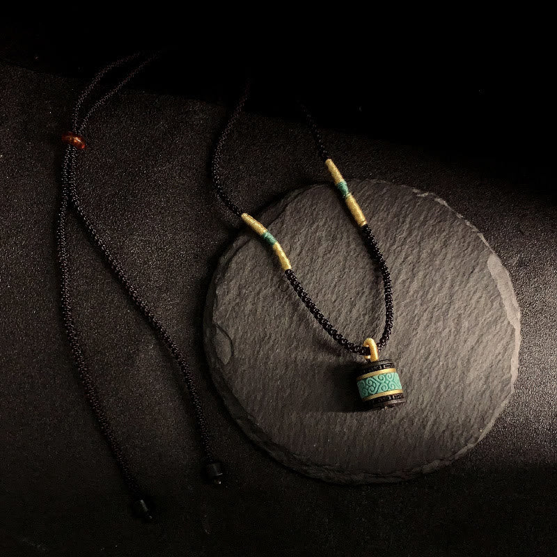 Collana con ciondolo della pace in legno di ebano e turchese Buddha Stones - image 2