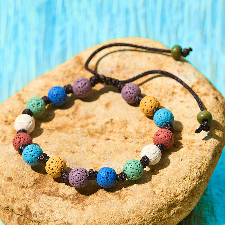 Braccialetto di supporto in pietra lavica colorata Buddha Stones - Perline colorate (circonferenza del polso: 15-22 cm) - image 1